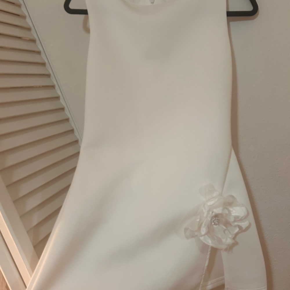 Elegant White Dress with Floral Detail